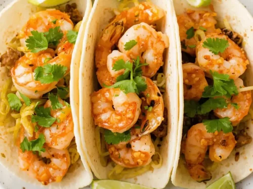 20-Minute Lemon Shrimp Tacos served in soft tortillas with fresh garnishes
