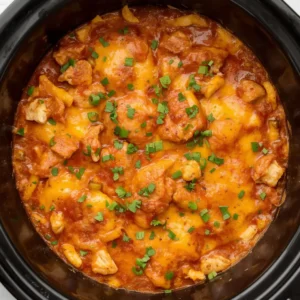 A hearty Crockpot Chicken Enchilada Casserole, freshly made and ready to serve.