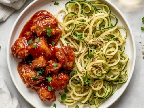 Plate of skinny BBQ chicken with zoodles