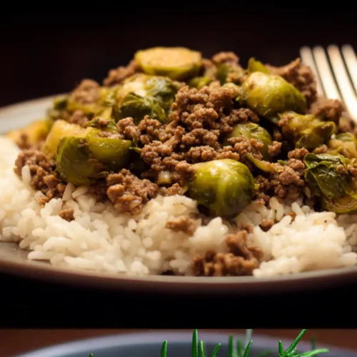 A close-up of a serving of ground beef and brussels sprouts in a bowl