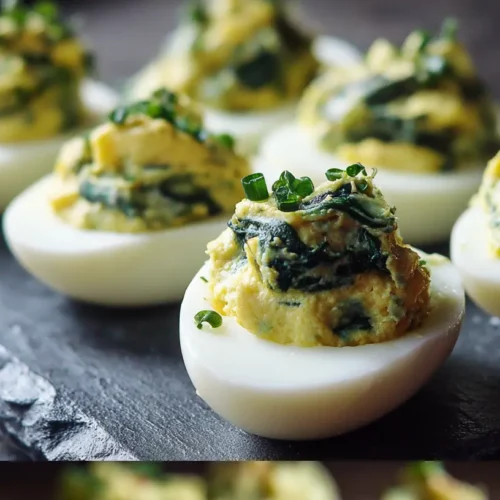 Keto spinach artichoke deviled eggs featuring creamy filling