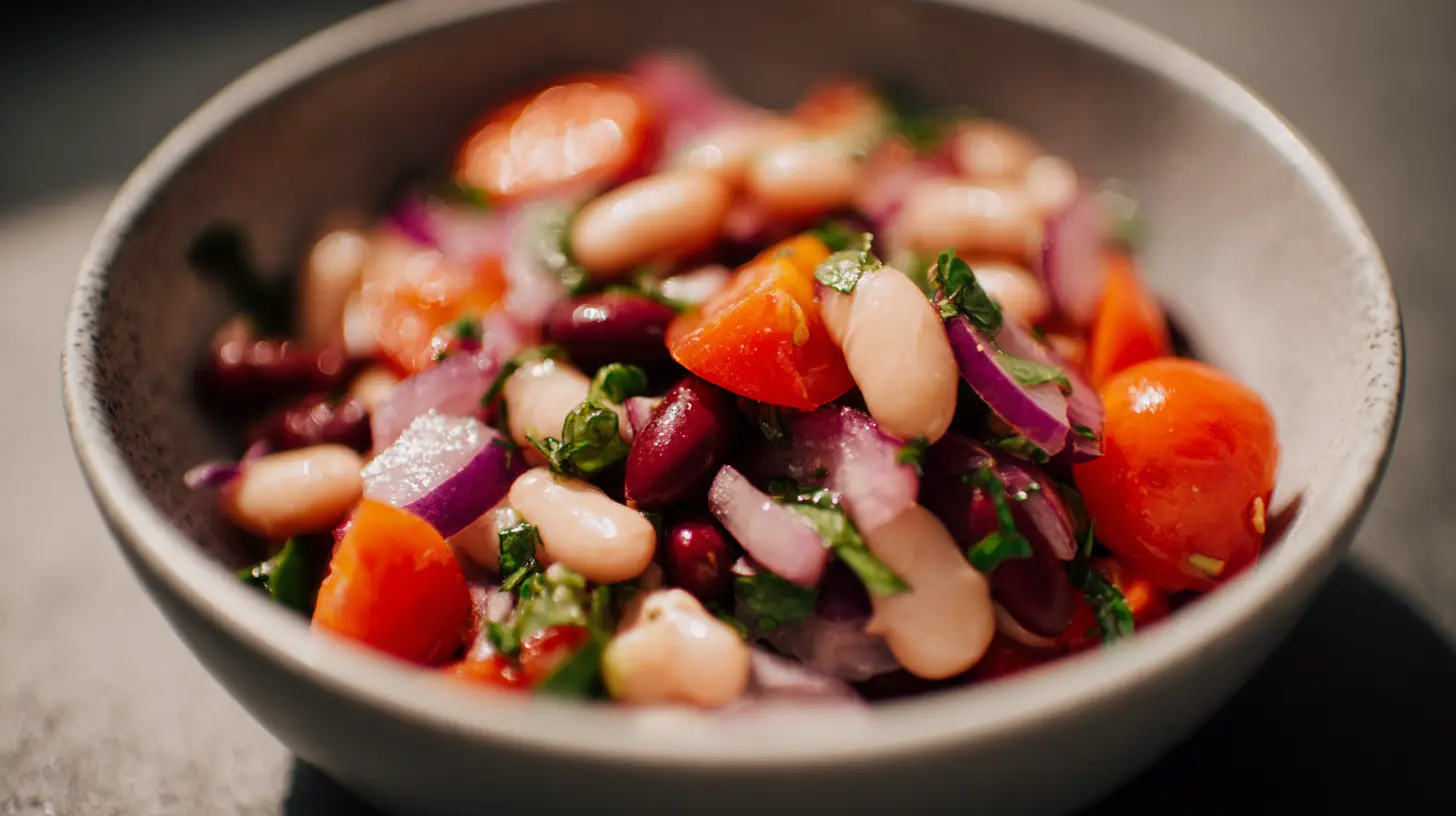 A colorful, freshly prepared easy bean salad in a glass bowl.