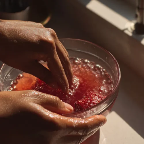 A delectable strawberry shortcake featuring fresh strawberries, whipped cream, and sweet biscuits